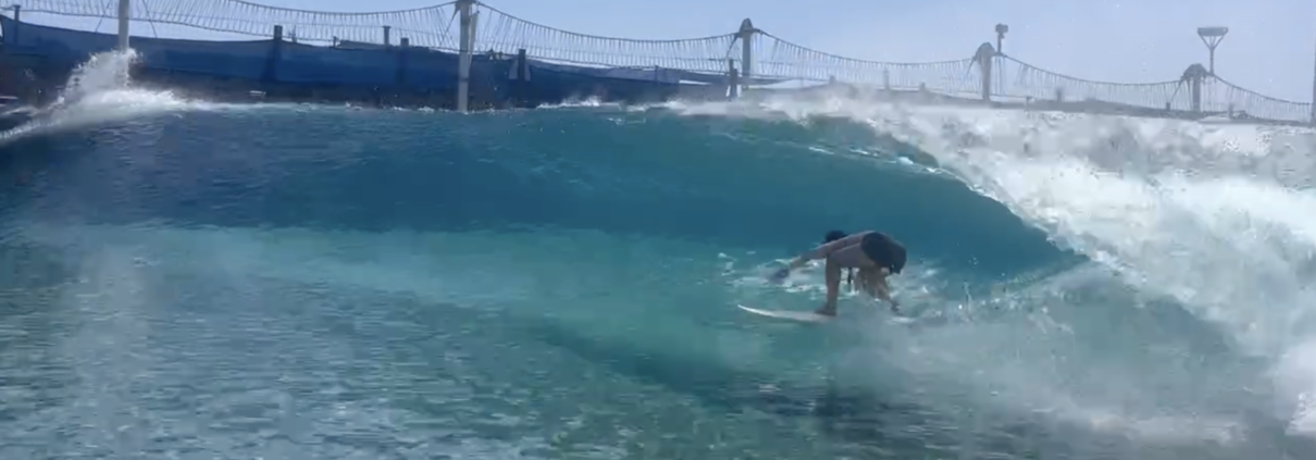 girl getting barreled at surf ranch